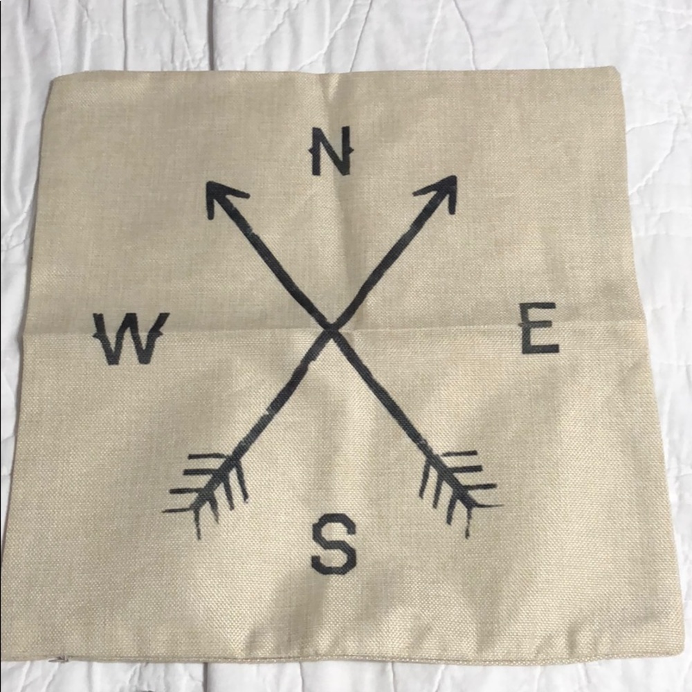 NEW. N S E W Arrow directional pillow cover